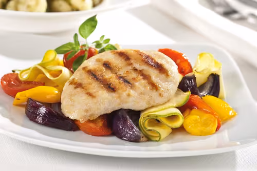 A picture of Red Tractor Raw Chicken Breast Fillet Portions